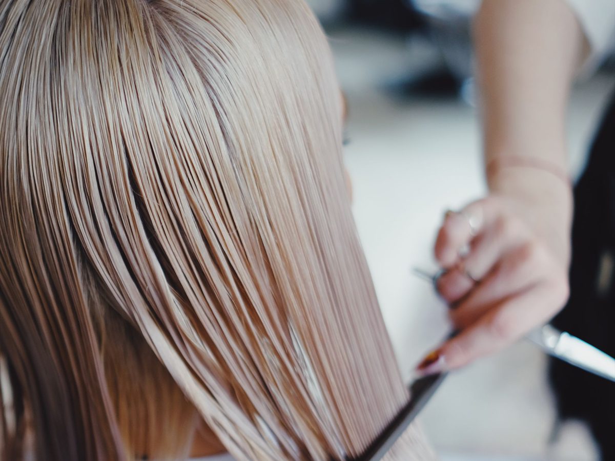 Freshly coloured and styled long hair in warm light
